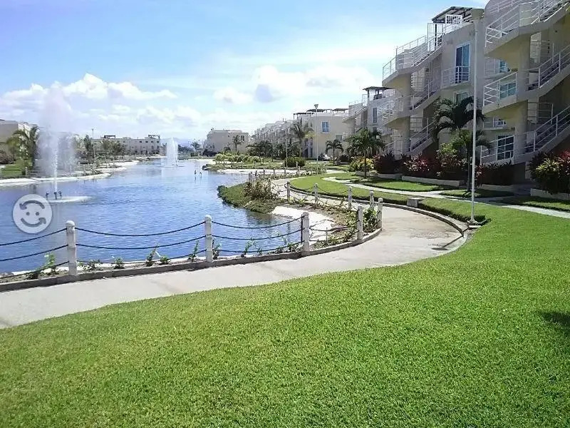 Departamento en Marina Diamante con lago y alberca