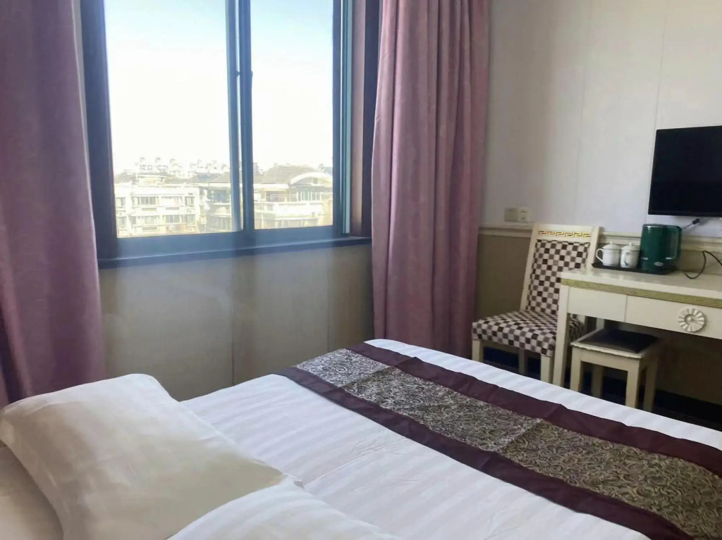 Shanghai Quanquan Hotel (Baoshan Wanda Plaza)