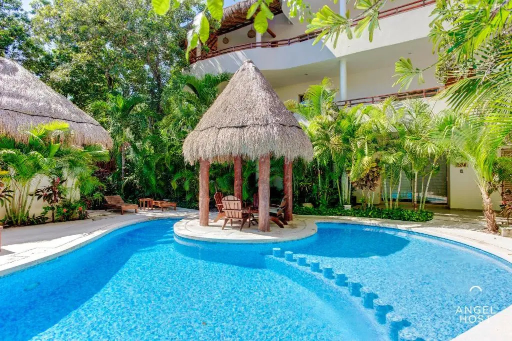 Condo Complex with an Alluring Pool & Tropical Vibes by Stella Rentals