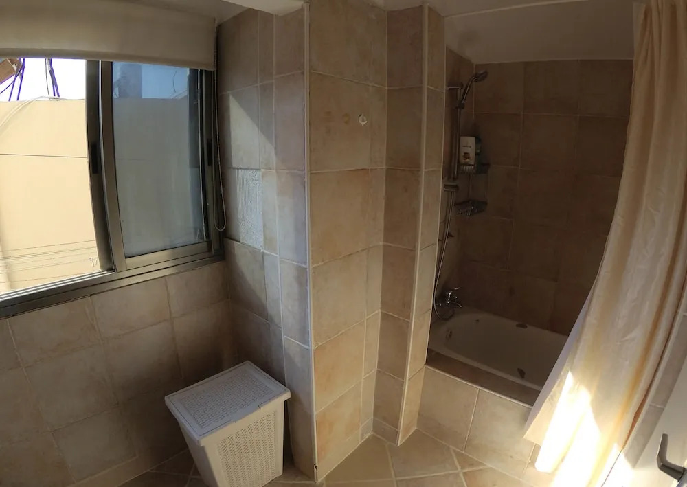 Bograshov Penthouse steps from the beach