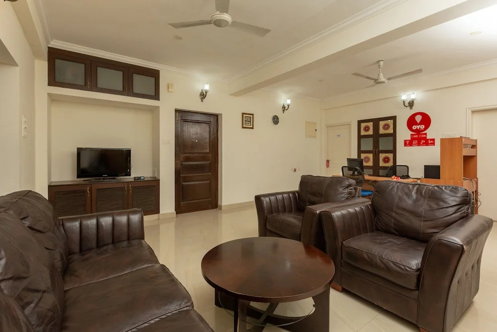 Cute Orange Service Apartments By OYO Rooms