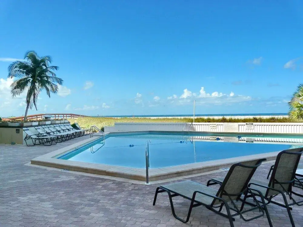 Inviting Beachfront Condo With Large Balcony and Pool