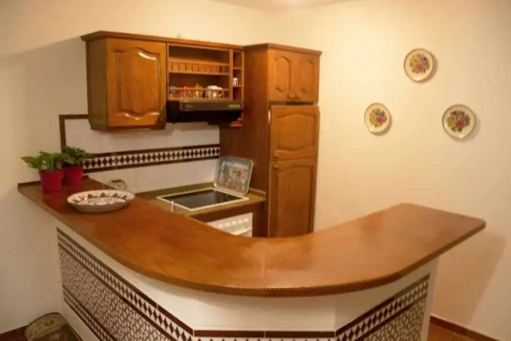 Apartamento con jardín y piscina B