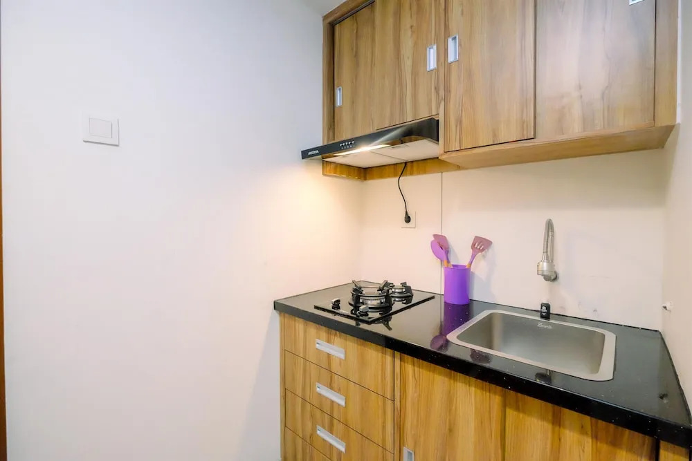 Cozy 1BR without Living Room Grand Kamala Lagoon Apartment By Travelio