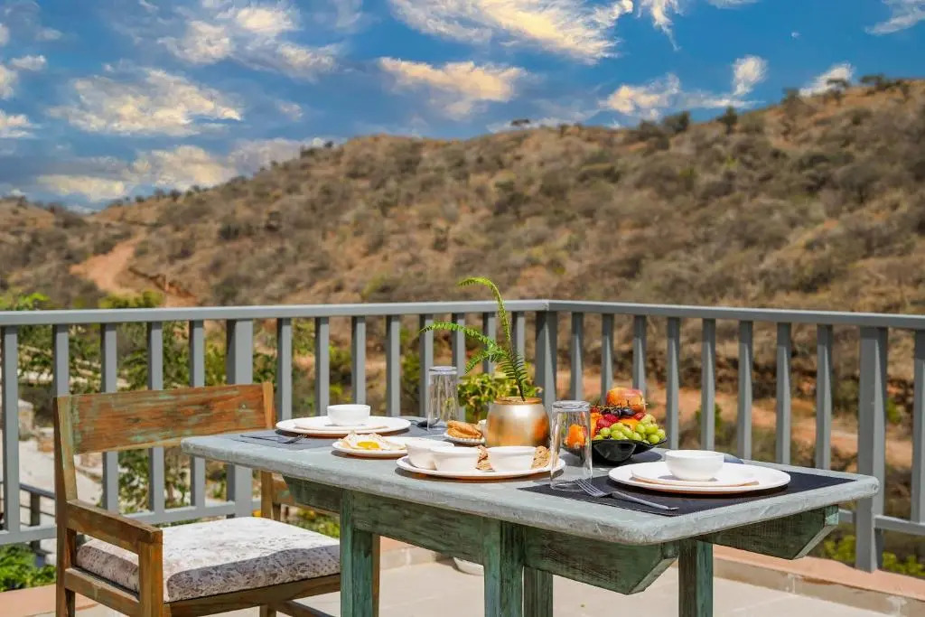 SaffronStays Moringa WishingTree - 3-BR villa near Nathdwara with pool, lawn and hillside views