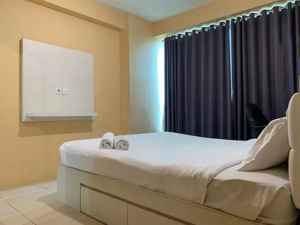 Warm And Cozy 2Br At Tifolia Apartment