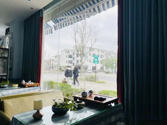 Jiuzhou Chain Theme Inn (Renhua Aiqinhai Fengqing Guanjing)