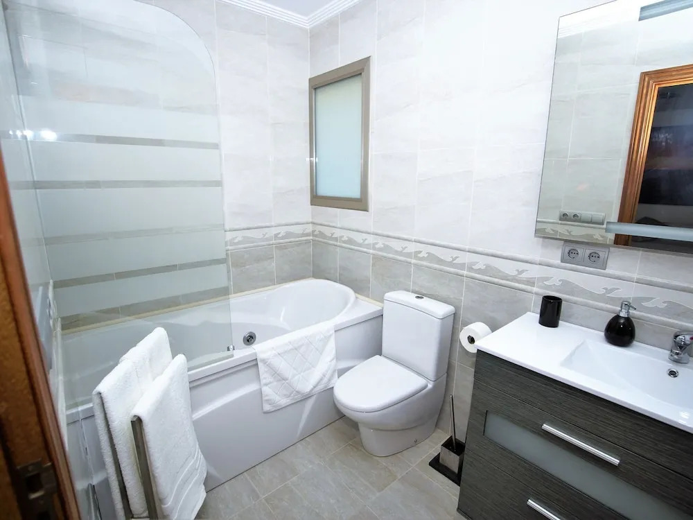Spacious modern villa, with beautiful waterfall in Talamanca near Ibiza town!