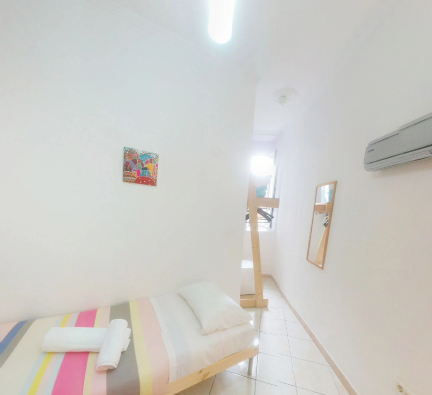 In the Center by Local Domus