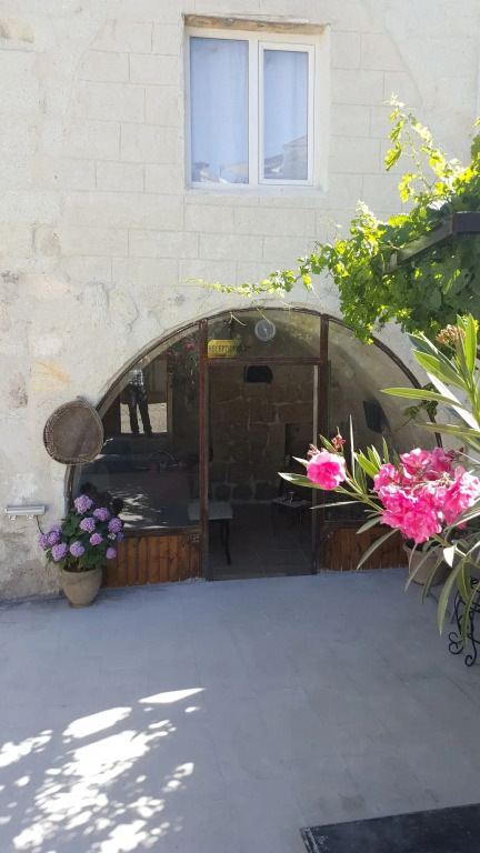 Whisper Cave House