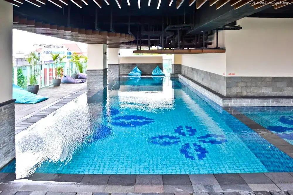 Trendy & Comfy Studio at Tamansari la Grande Apartment