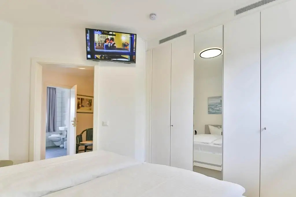 Ferienwohnung Tine mit Balkon, Fahrrädern und Strandkorb im Sommer