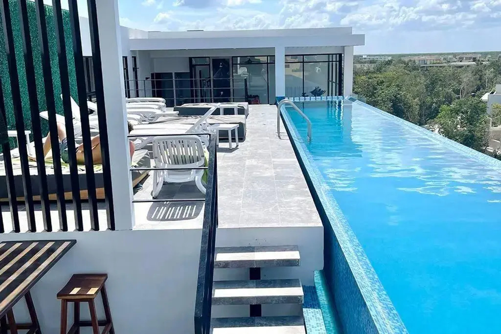 Fresh and Stylish Studio Aldea Zama rooftop pool Mya 109
