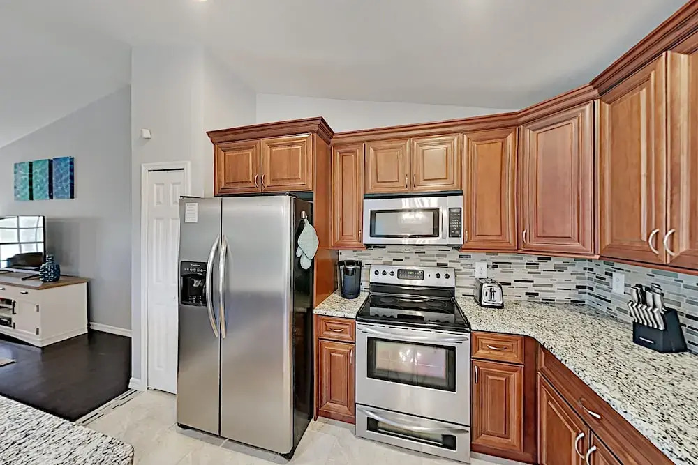 Stylish Tropical Getaway W/ Pool & Oversized Yard 3 Bedroom Home