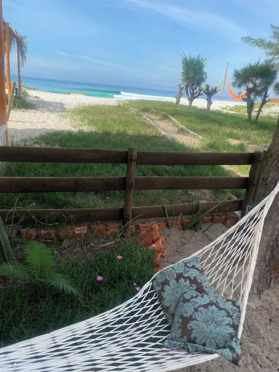 Pé na areia.