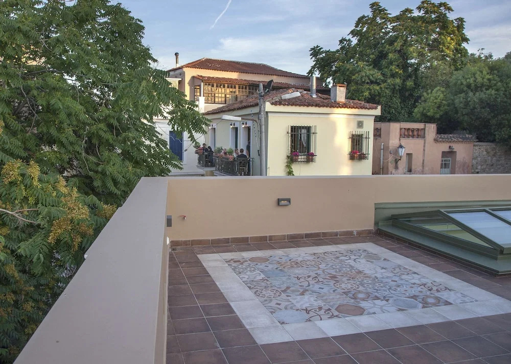 Tripodon Plaka In the shade of Acropolis by GHH