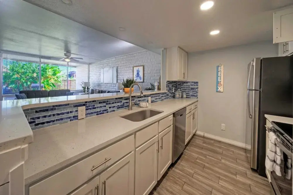 Beach Boardwalk Access Pool + Remodeled Interior Tropical Haven by Avantstay