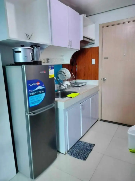 Cozy Studio Unit in Quezon City With Private Pool and City Views