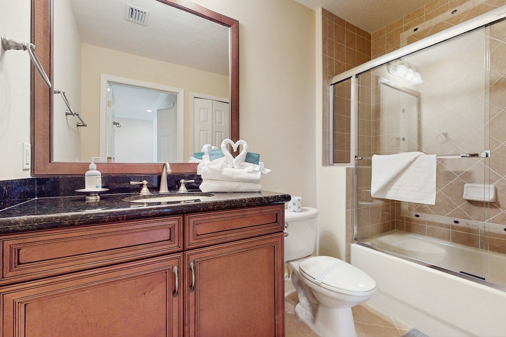 Top-floor 2BR Condo With Golf Course Views, Garage & Reunion Resort Amenities