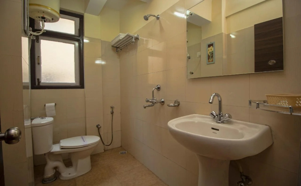 Hotel Mmg Lodge by OYO Rooms