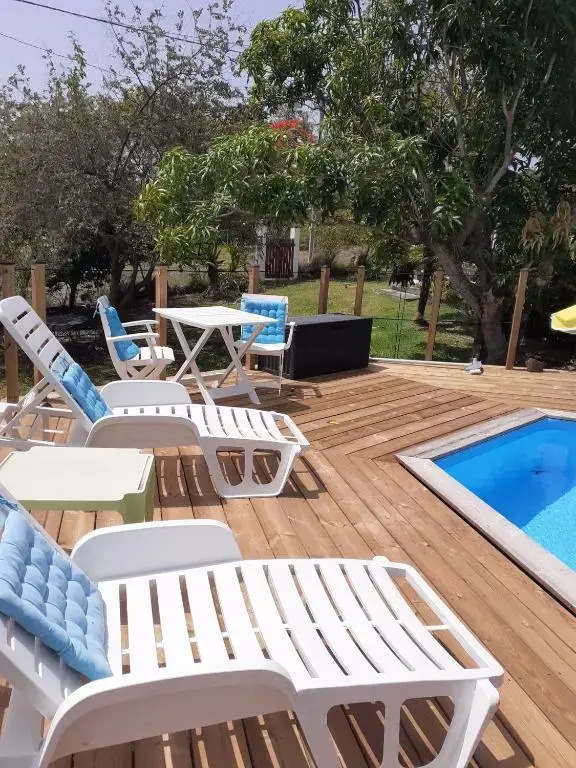 Maison d'une chambre avec piscine partagee jardin clos et wifi a Sainte Anne a 4 km de la plage