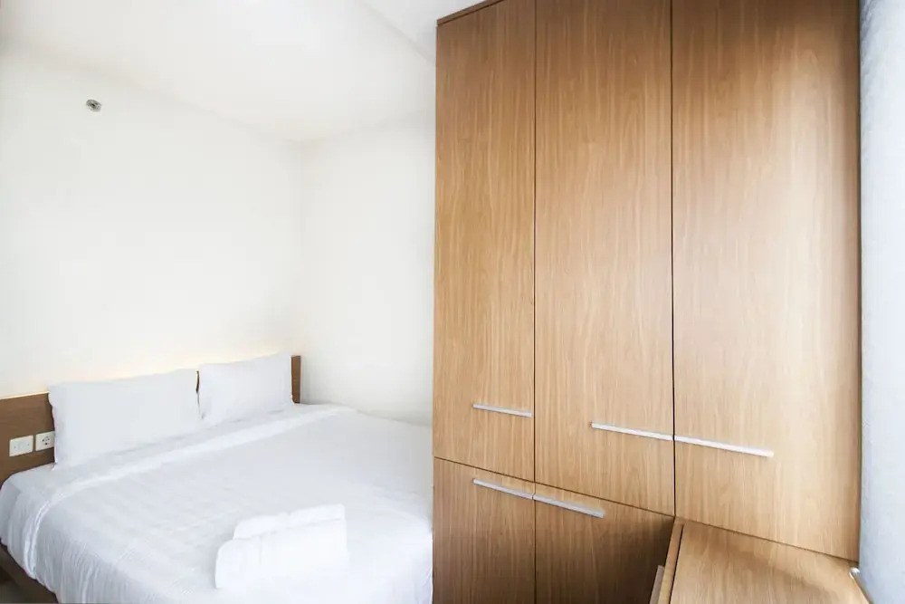 2BR Cozy at Empyreal Epicentrum Apartment By Travelio