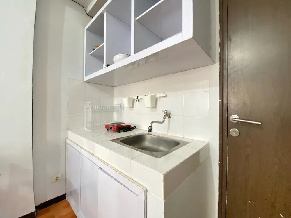 Modern Designed 2BR at Suites @Metro Apartment By Travelio