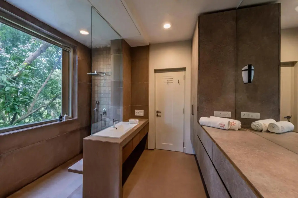 SaffronStays Odeon - 4BR heritage art deco villa with cantilever pool, verandahs & forested lawns