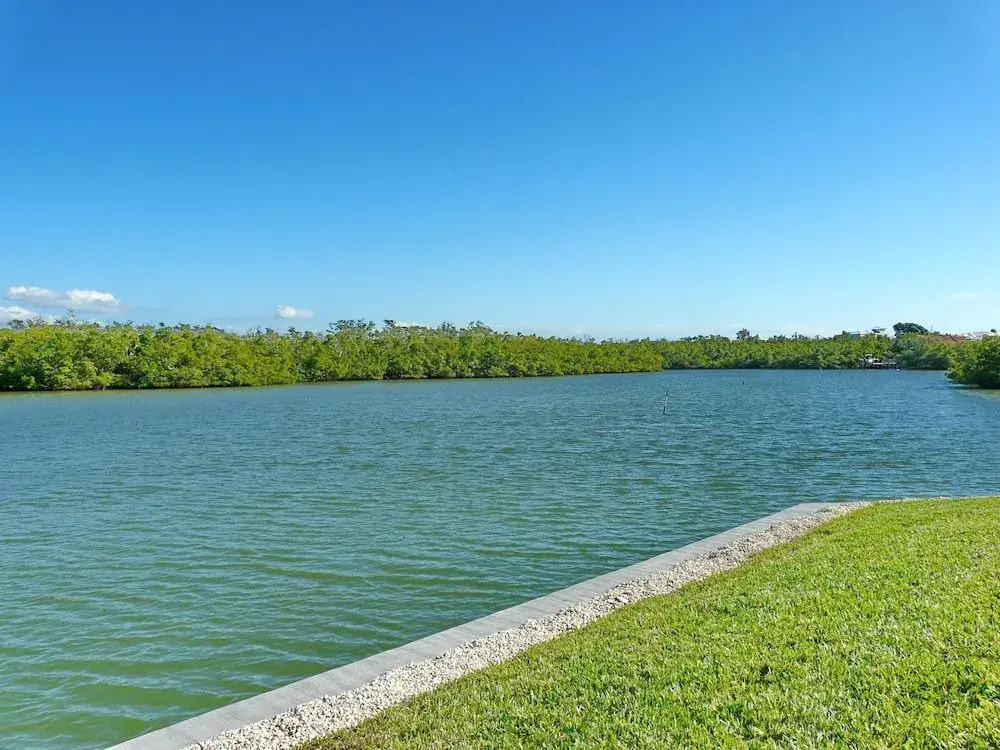 Waterfront home on key lot with pool/view of river