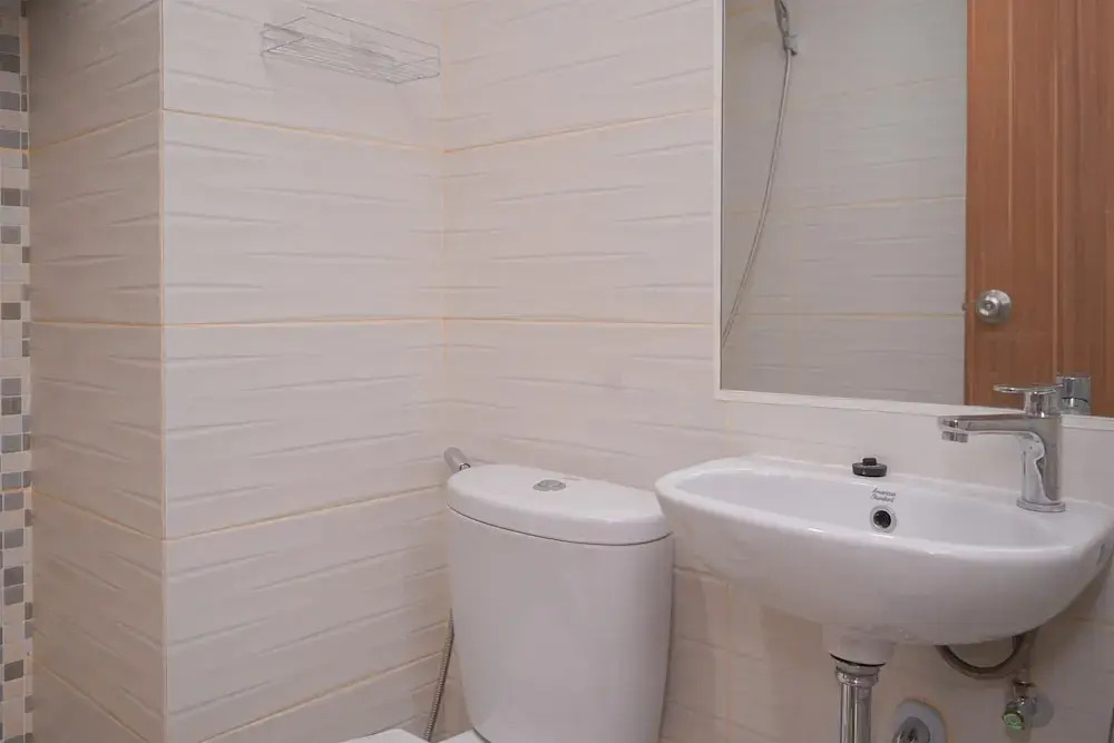 Minimalist And Warm Studio Room At Cisauk Point Apartment