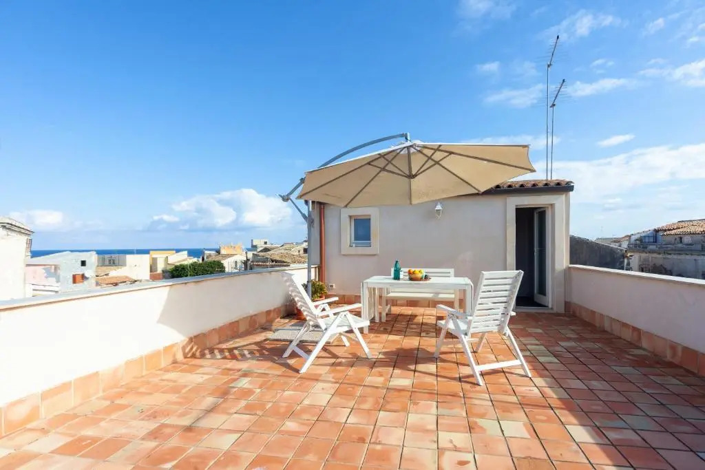 GuestHost - Mercato di Ortigia Apartments
