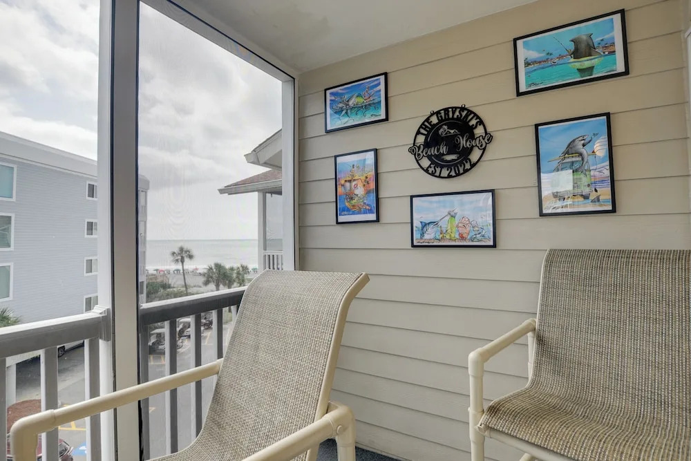 Pelicans Watch Beachfront Condo With Ocean Views!