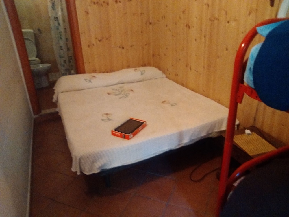 Single room with shared bathroom