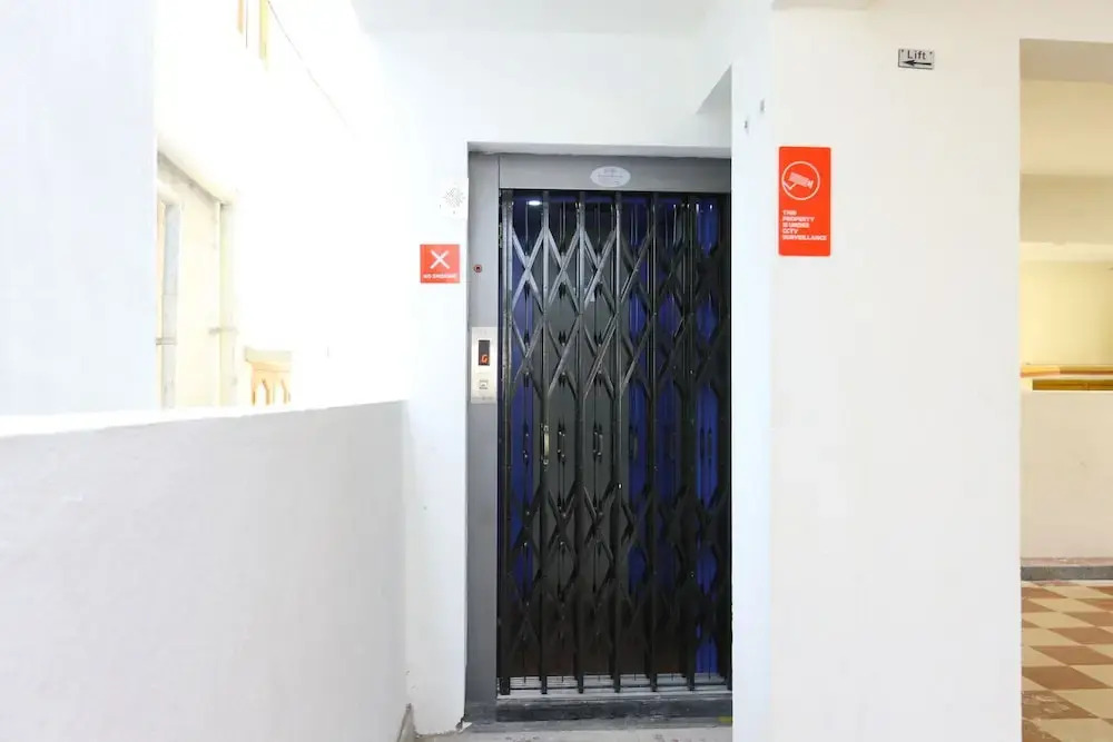 OYO 10701 Moukthi Apartment