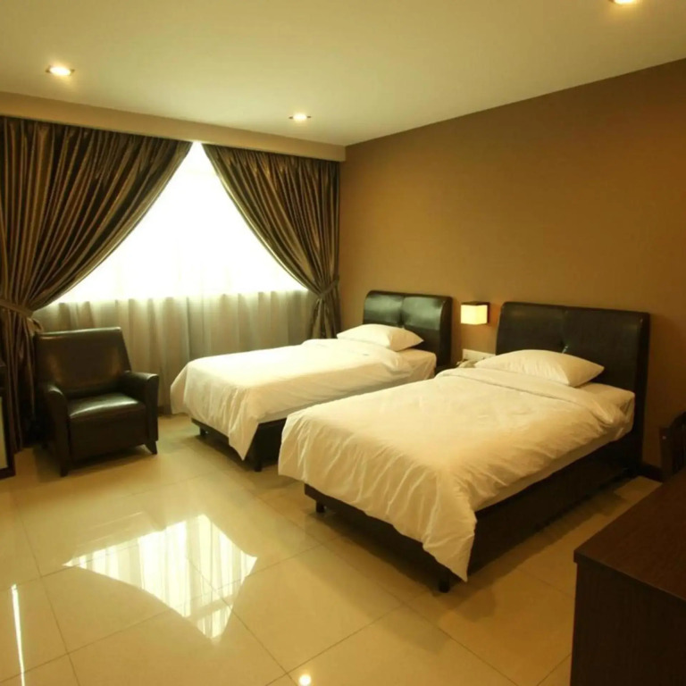Capital O Rail Hotel