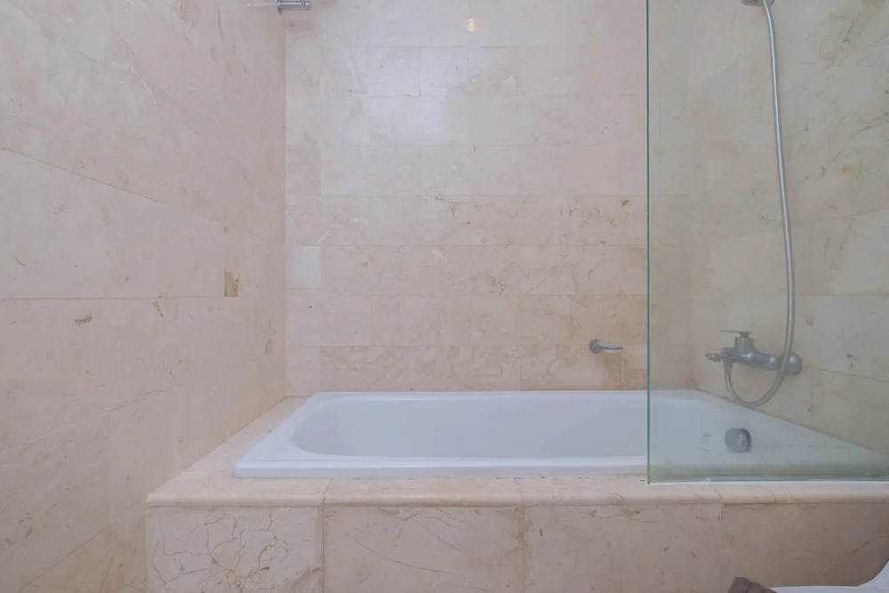 Luxury and Strategic 1BR Apartment at The Empyreal Epicentrum By Travelio