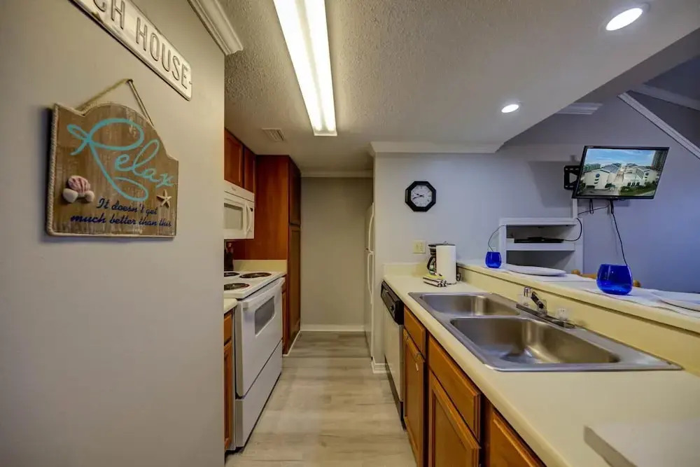 Sunset views overlooking the sugar sands in Orange Beach with multiple pools