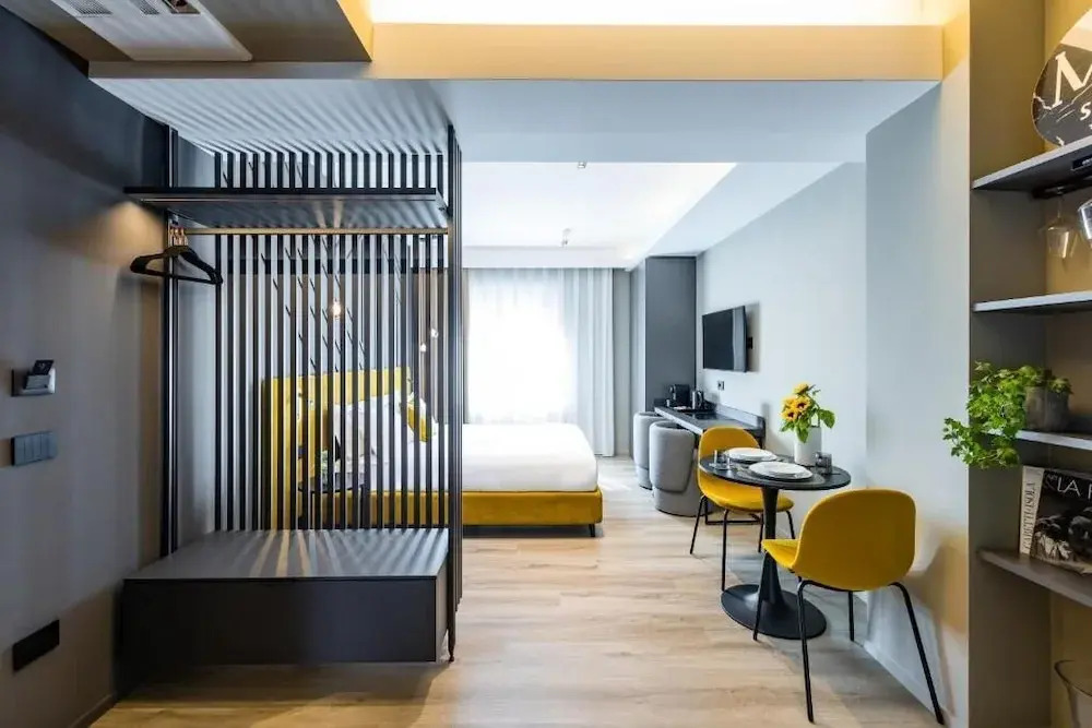 MH SUITES Plebiscito