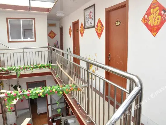 Longhe Yujia Hotel