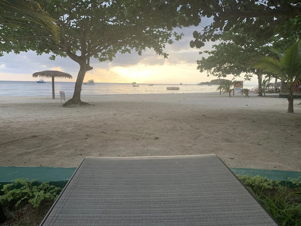 King Suite at Oceanview Resort in Jamaica - Enjoy 7 Miles Of White Sand Beach! 1 Bedroom Villa by RedAwning