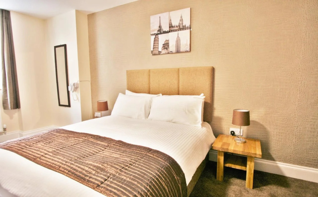 New County Hotel & Serviced Apartments by RoomsBooked