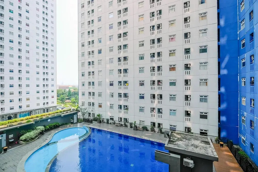 Comfy and Great Choice 2BR Green Pramuka City Apartment By Travelio