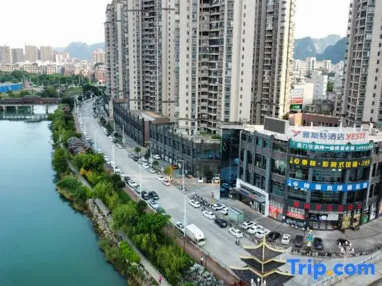 Yeste Hotel (Du'an High - speed Railway Station Binjiang Zhuangyuan Food Street Branch)