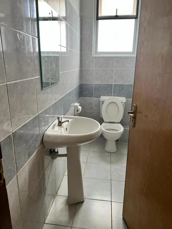 Karibu Nyumbani (2 bdroom apt with a swimming pool