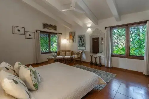 The Beach House by StayVista with Modern interiors, nearby beach, pool, lawn