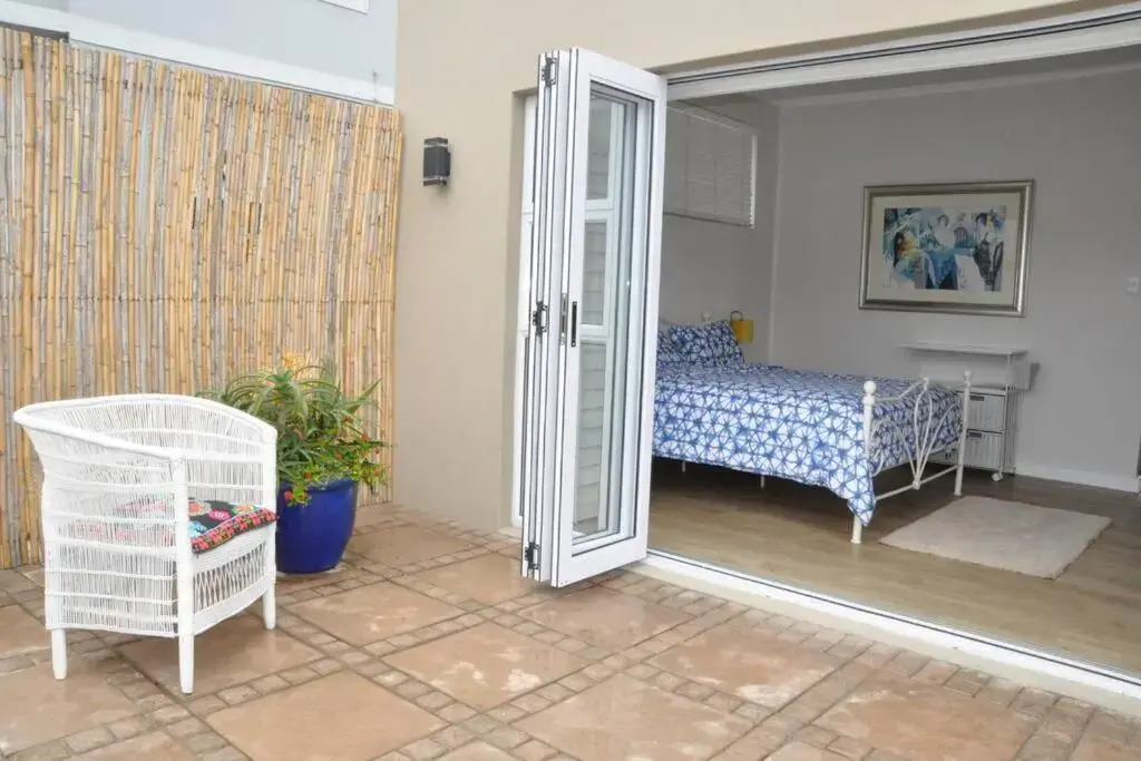 Private room with own entrance, patio and garden.