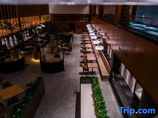 Ligang Hotel (Yuhuan Chumen Passenger Transport Center Commercial Exhibition Center Store)