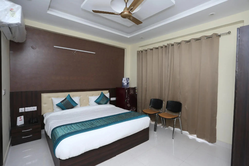 OYO Flagship 12081 Palm Garden Suites