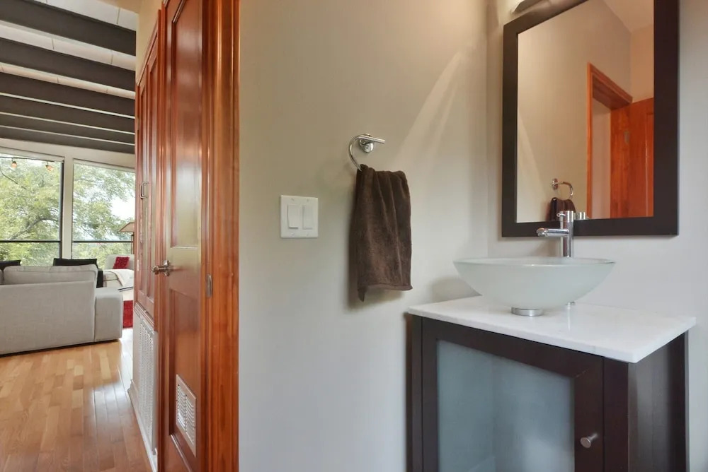 W 6th St Penthouse with City Views by RedAwning