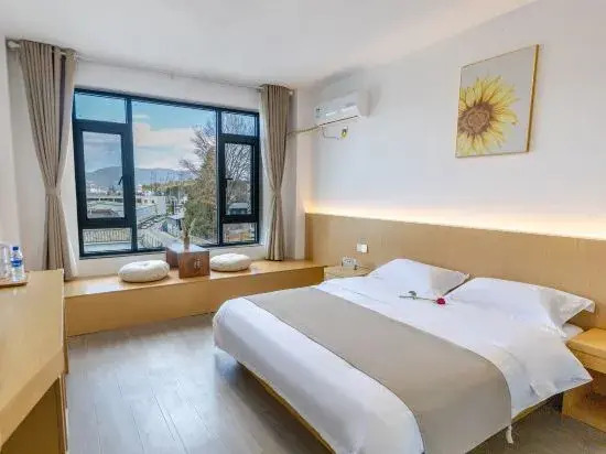 Xinhe Xiaoyuan Homestay (Lijiang High speed Railway Station)